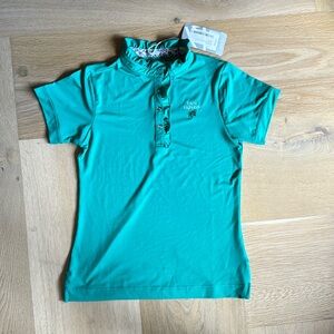 NEW WITH TAGS Golf/ Tennis polo with ruffle.  Pairs excellent with posted set.